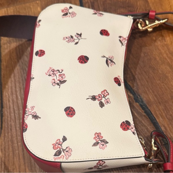 Coach Red and White Crossbody Bag with Floral and Ladybug Design - Picture 6 of 16